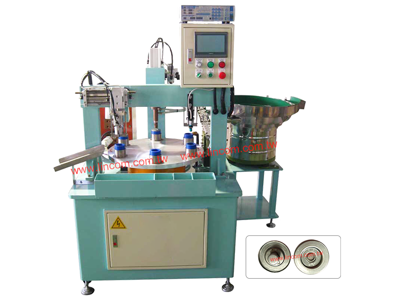 Rotary spot welder with material auto feeder.