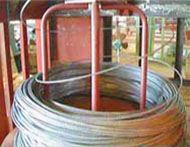 Wire rod coil loading on coil stand (wire stand).