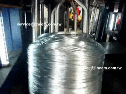 Result of zinc coating wire after tin plating surface treatment. Coil discharge. Wire hot dip galvanizing plant from Taiwan.